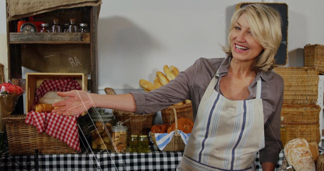 Smiling Female Baker Showcasing Breads and Jars at Rustic Bakery Stall