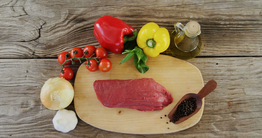 Fresh Beef with Vegetables and Seasoning on Rustic Wooden Table - Free Images, Stock Photos and Pictures on Pikwizard.com