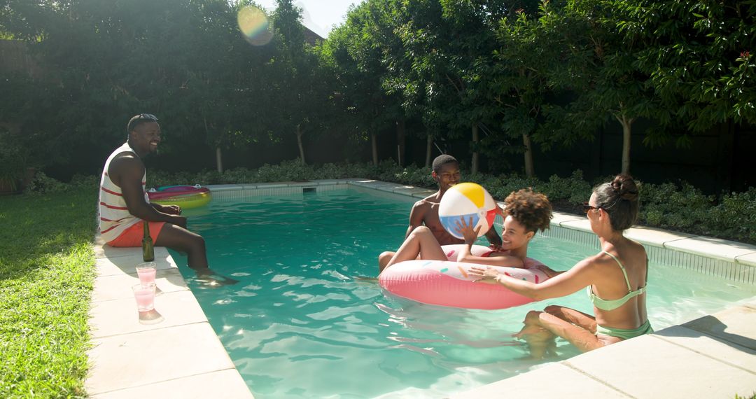 Friends Enjoying a Sunny Day at Backyard Poolside