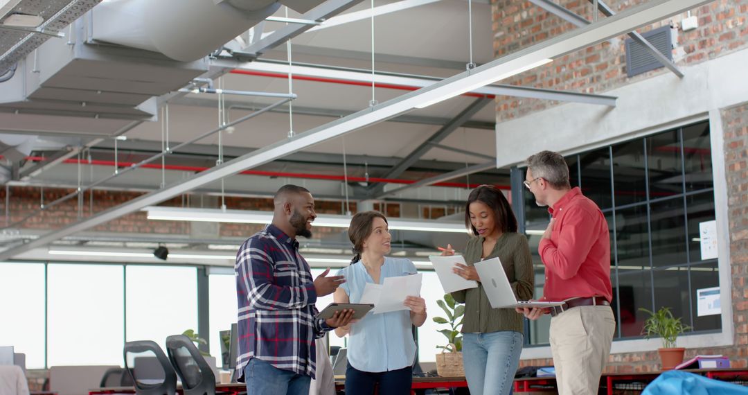Diverse Team Collaborates in Modern Office Setting