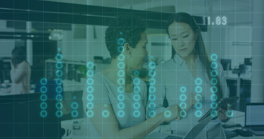 Two Office Professionals Collaborating Over Digital Data Interface