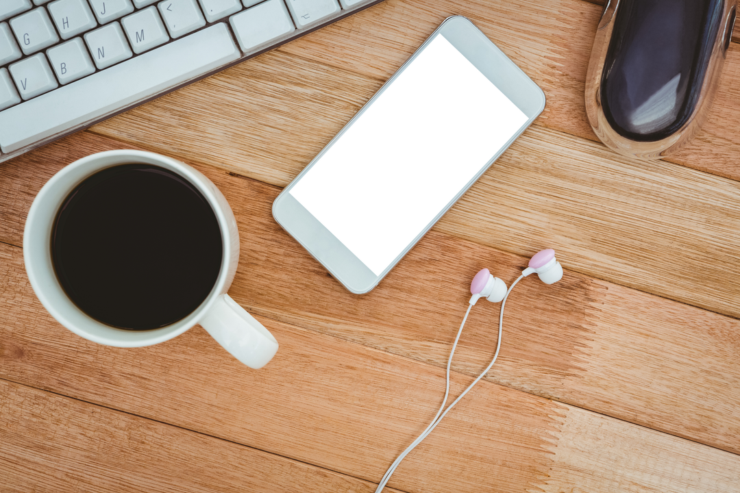 Transparent Smartphone with Coffee and Workspace Essentials - Download Free Stock Images Pikwizard.com