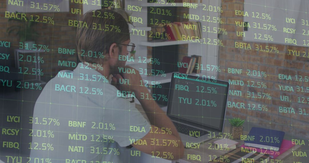 Man Analyzing Stock Market Data on Laptop - Free Images, Stock Photos and Pictures on Pikwizard.com