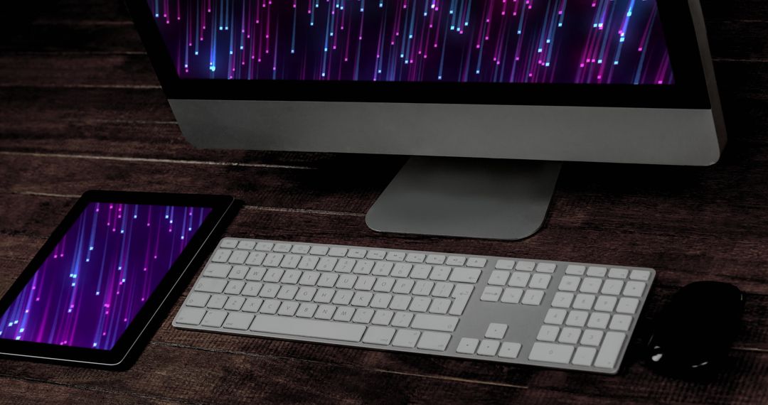 Modern Office Setup with Computer and Tablet on Wooden Desk