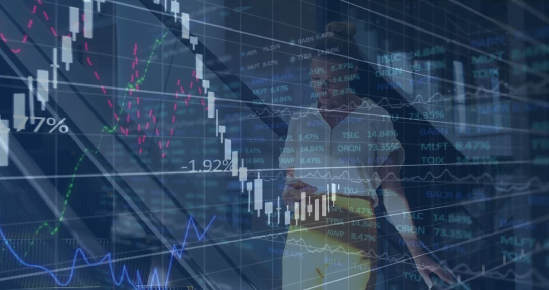 Businessman Engaging with Financial Data and Graphs