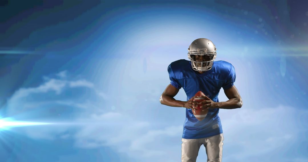 Confident American Football Player with Ball Against Sky