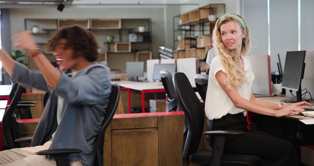 Creative Office Space with Colleagues Engaged in Brainstorming