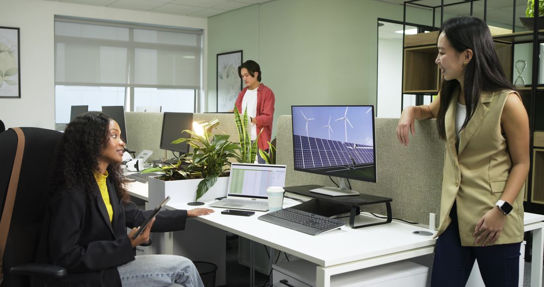 Diverse Team Collaborating on Sustainable Energy Project