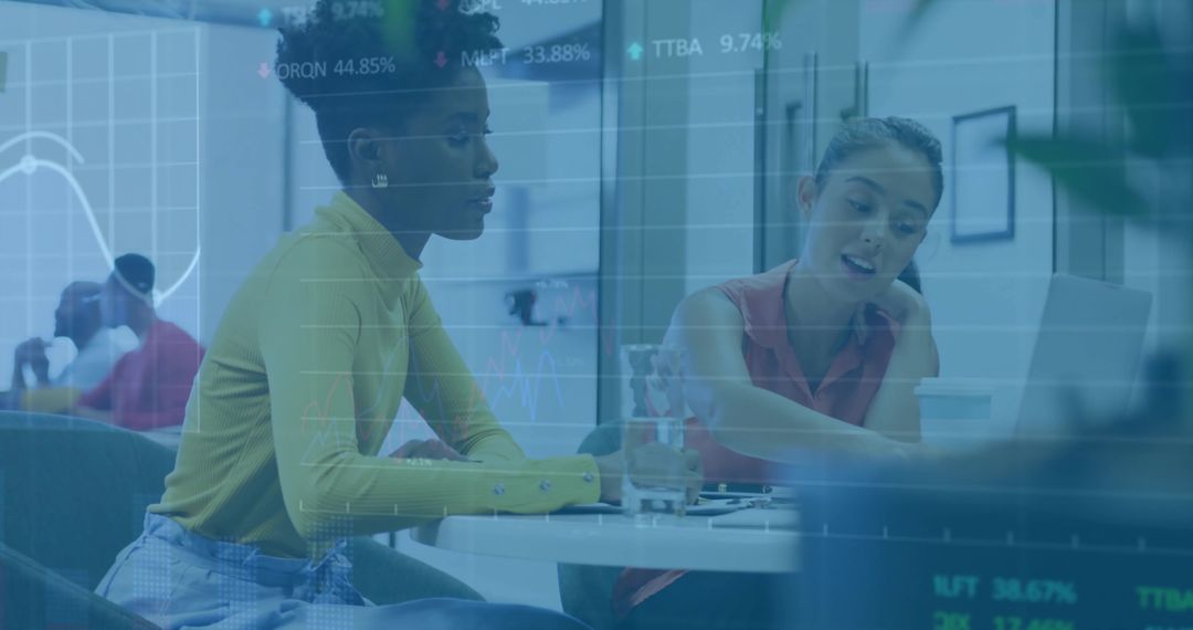 Focused Coworkers Collaborating in Modern Office Environment