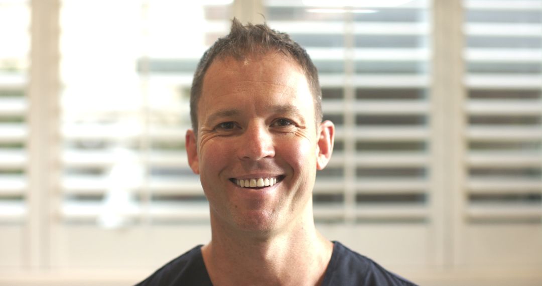 Smiling Professional in Casual Setting