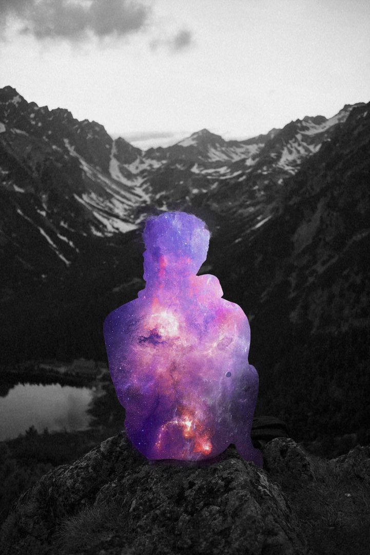 Person with Vibrant Galaxy Overlay against Mountain Landscape - Free Images, Stock Photos and Pictures on Pikwizard.com