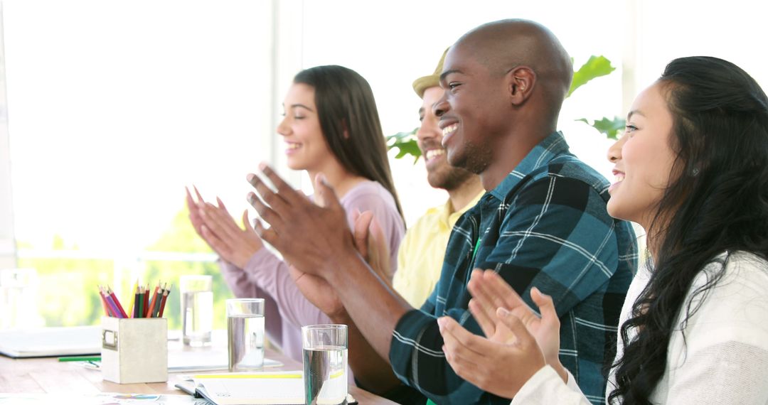 Diverse Team Applauding during Meeting in Bright Office - Free Images, Stock Photos and Pictures on Pikwizard.com