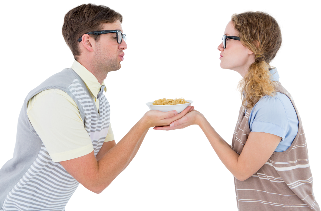 Geeky Hipster Couple Holding and Kissing Over Transparent Bowl of Pasta - Download Free Stock Images Pikwizard.com