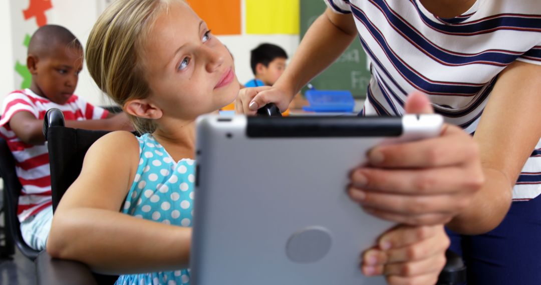 Young Student Engaging with Tablet in Classroom - Free Images, Stock Photos and Pictures on Pikwizard.com