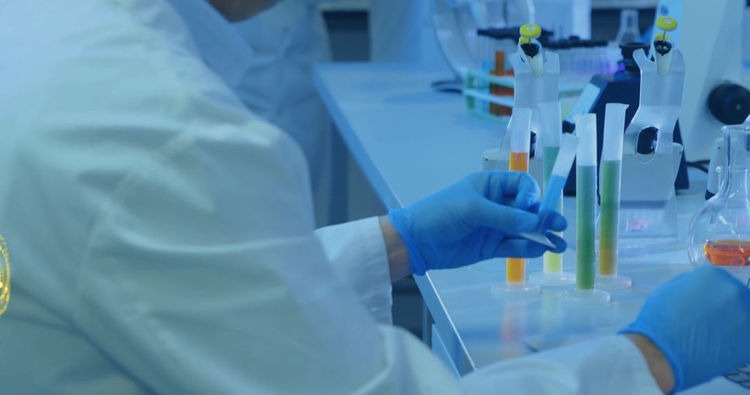 Scientist Handling Test Tubes in Modern Laboratory