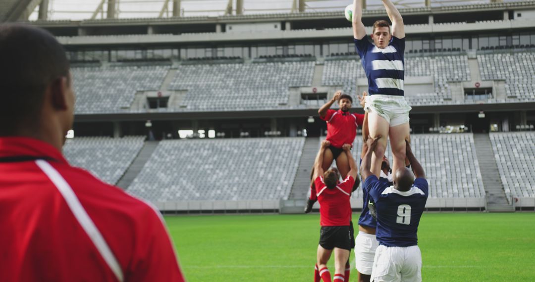 Team Lift in Rugby Match, High Jump for Ball in Stadium - Free Images, Stock Photos and Pictures on Pikwizard.com