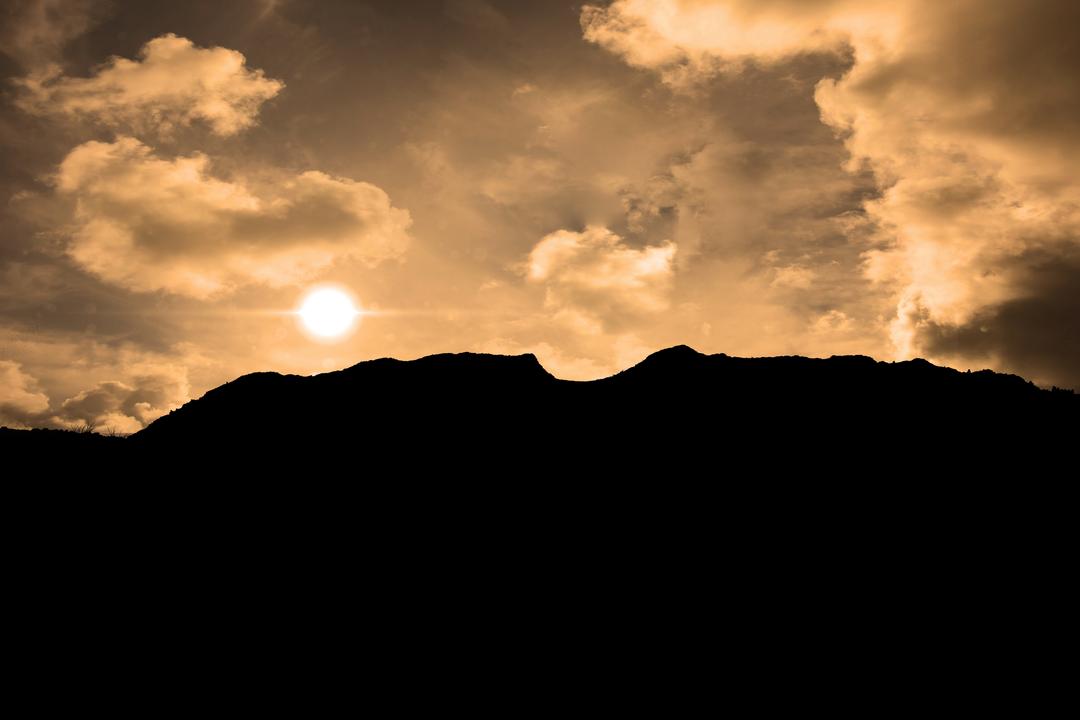 Silhouetted Mountain Range with Dramatic Evening Sky - Free Images, Stock Photos and Pictures on Pikwizard.com