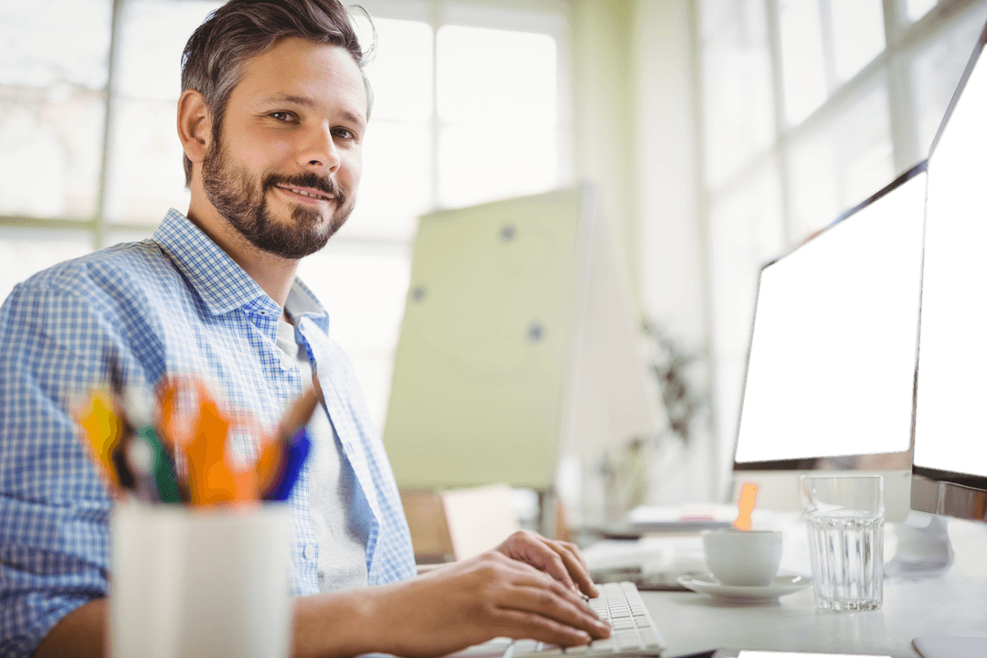 Transparent Office Worker Typing at Desk in Bright Environment