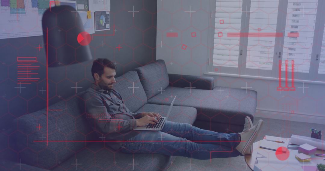 Digital Data Overlay on Man Using Laptop at Home