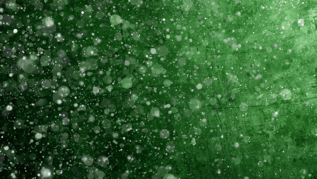 Abstract Green Bokeh on Textured Background with Floating Light Effects