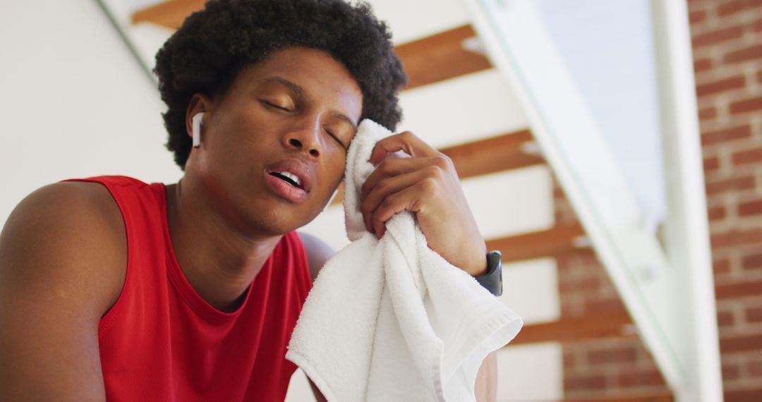 Tired African American Man Resting After Home Workout