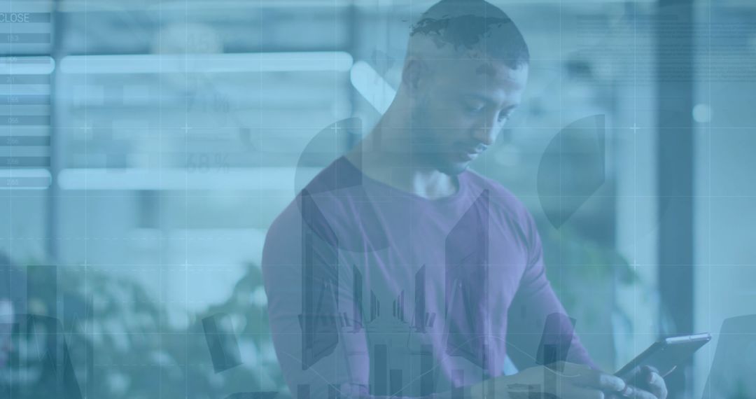 Businessman Analysing Financial Data on Tablet in Modern Office