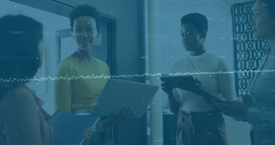 Diverse Team Analyzing Financial Data in Innovative Workspace