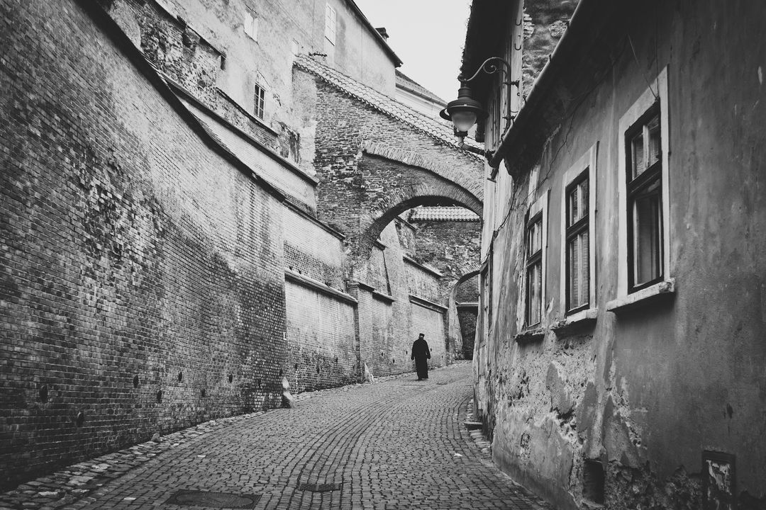 Old Town Cobblestone Path in Serene Black and White