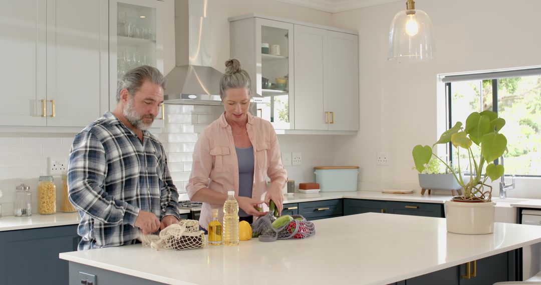 Senior Couple Unpacking Vegetables for a Wholesome Meal