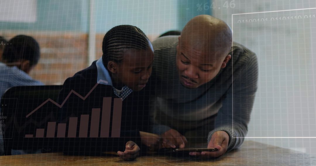 Teacher and Student Analyzing Digital Data on Tablet