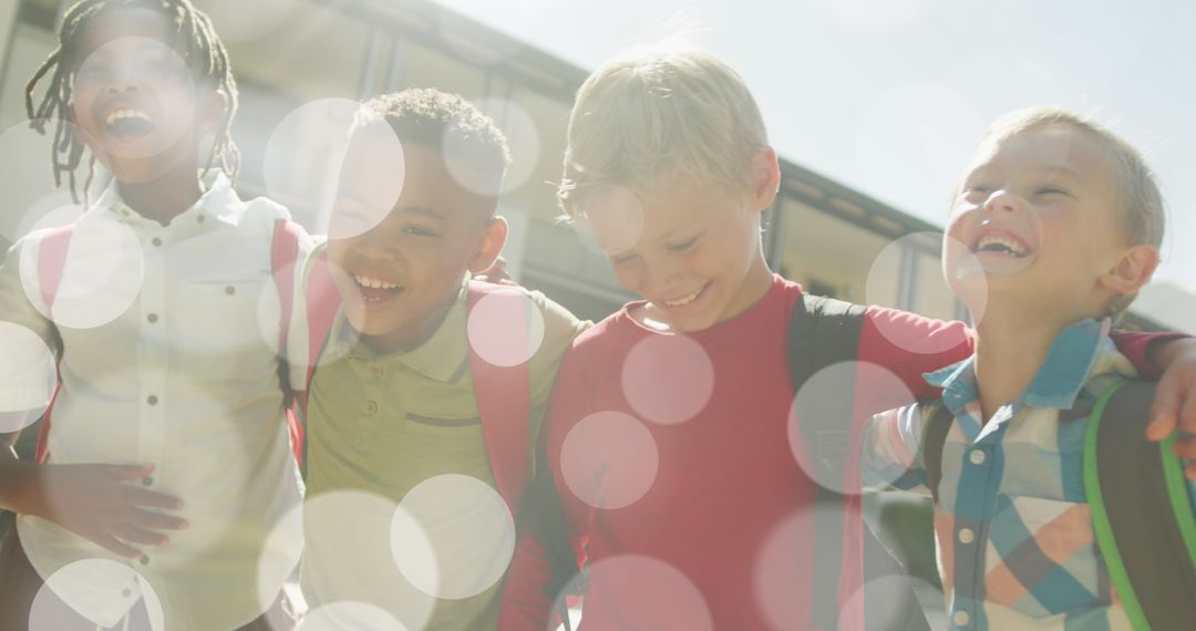 Joyful Schoolboys Walking Together with Bokeh Lights