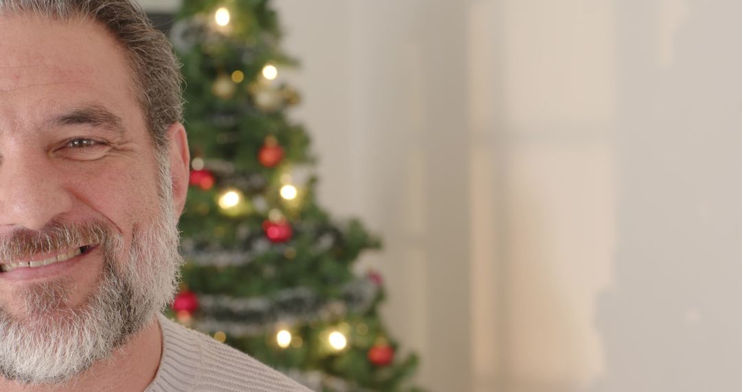 Happy Senior with Christmas Tree Lights in Background