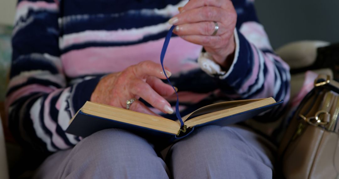 Close-up of Senior Woman Reading a Book at Home - Free Images, Stock Photos and Pictures on Pikwizard.com