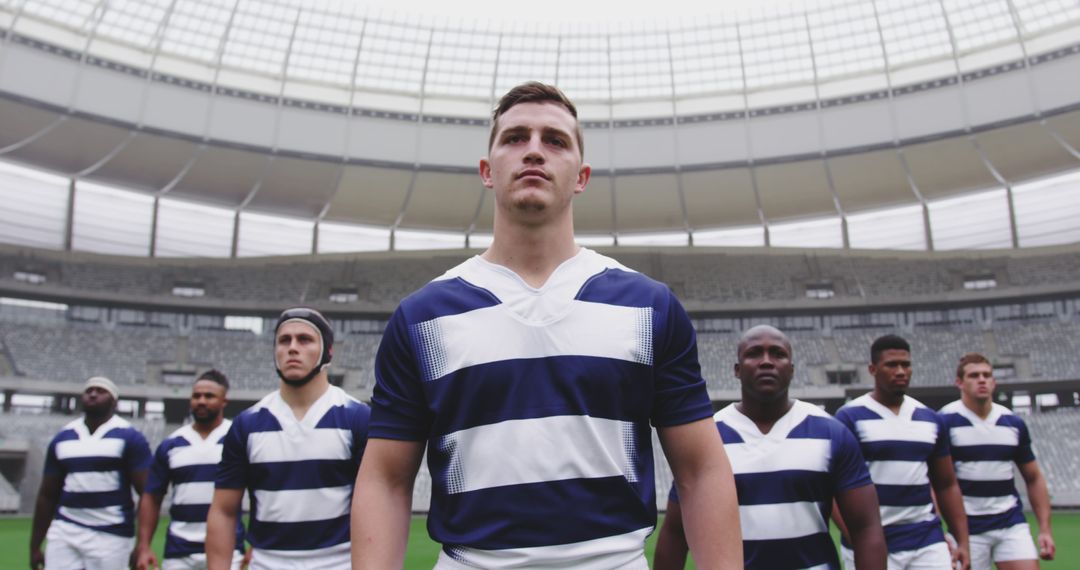 Determined Rugby Team in Stadium Wearing Matching Uniforms - Free Images, Stock Photos and Pictures on Pikwizard.com