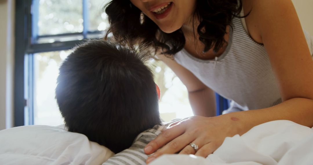 Happy Mother Talking with Child at Home - Free Images, Stock Photos and Pictures on Pikwizard.com