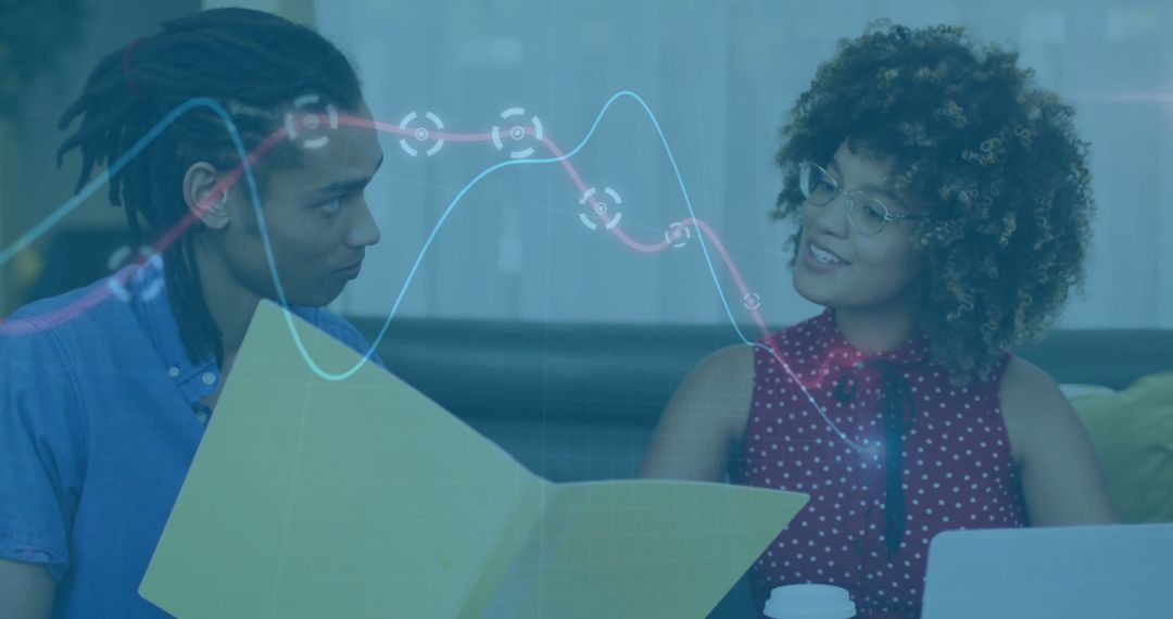 Colleagues Collaborating on Data Analysis with Digital Projection