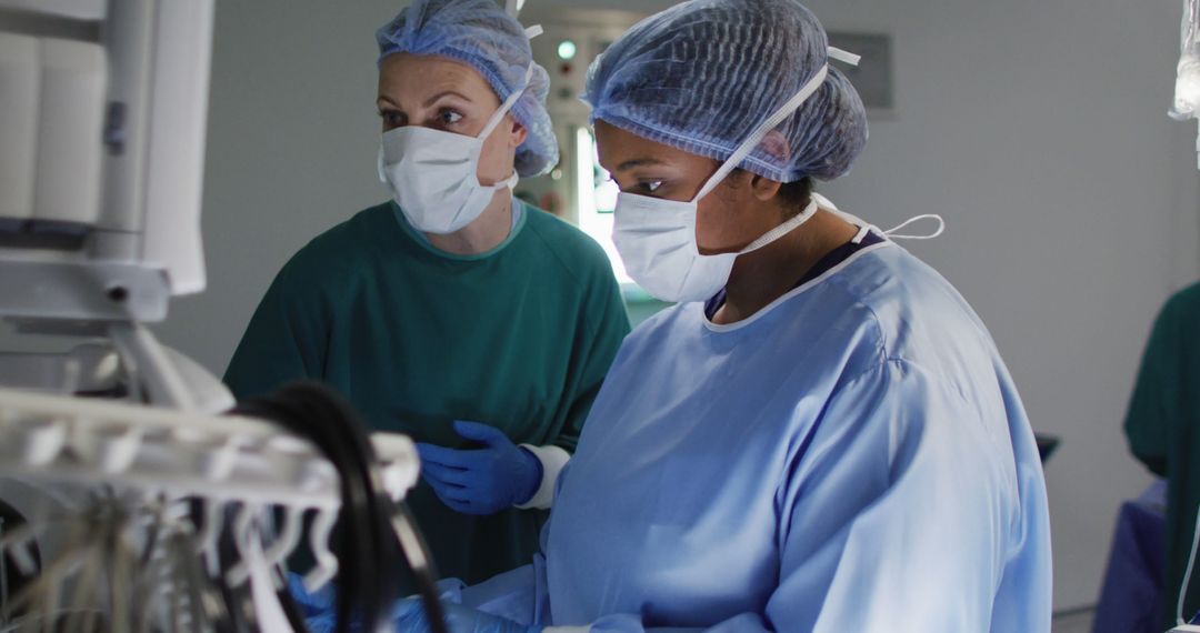 Female Surgeons Performing Surgery in Operating Room - Free Images, Stock Photos and Pictures on Pikwizard.com