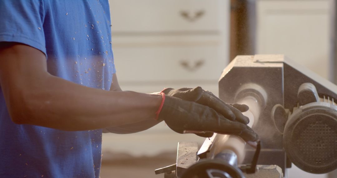 Craftsman Skillfully Shaping Wood on Lathe in Workshop