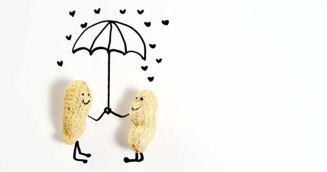 Cute Peanuts Holding Umbrella with Hand-Drawn Hearts - Free Images, Stock Photos and Pictures on Pikwizard.com