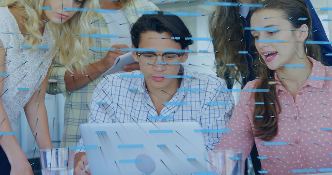 Team Collaboration in Modern Office Meeting with Laptop