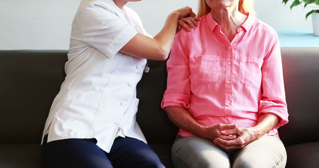 Nurse Assisting Senior Female Resident in Comforting Environment - Free Images, Stock Photos and Pictures on Pikwizard.com