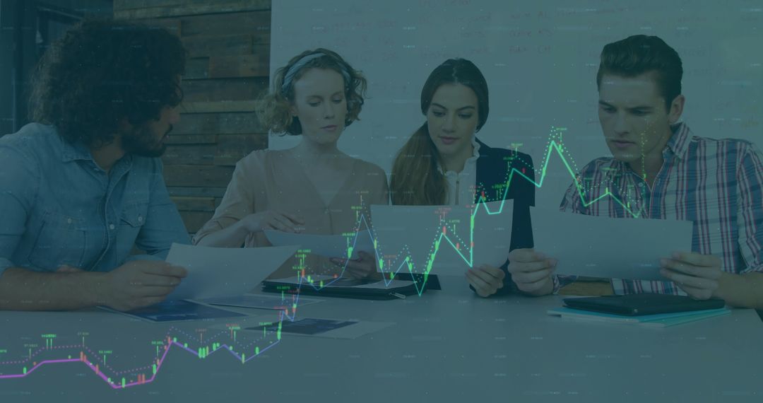 Team Reviewing Financial Graphs with Collaborative Analysis