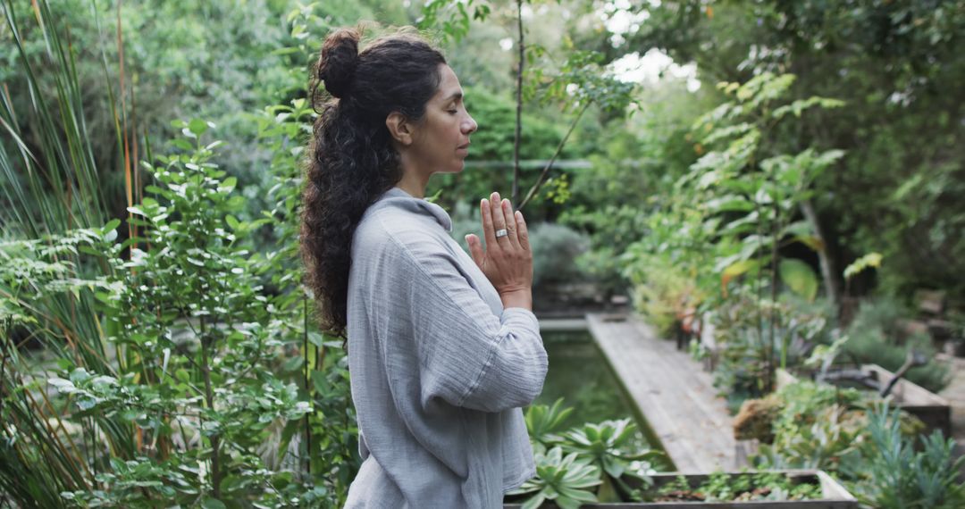 Mindful Woman Practicing Yoga Outdoors in Garden - Free Images, Stock Photos and Pictures on Pikwizard.com