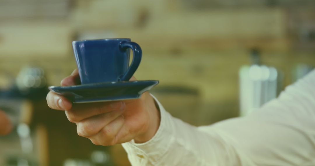 Barista Offering Coffee in Rustic Cafe Setting