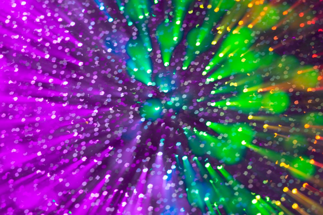 Abstract Colorful Light Burst with Glittering Particles