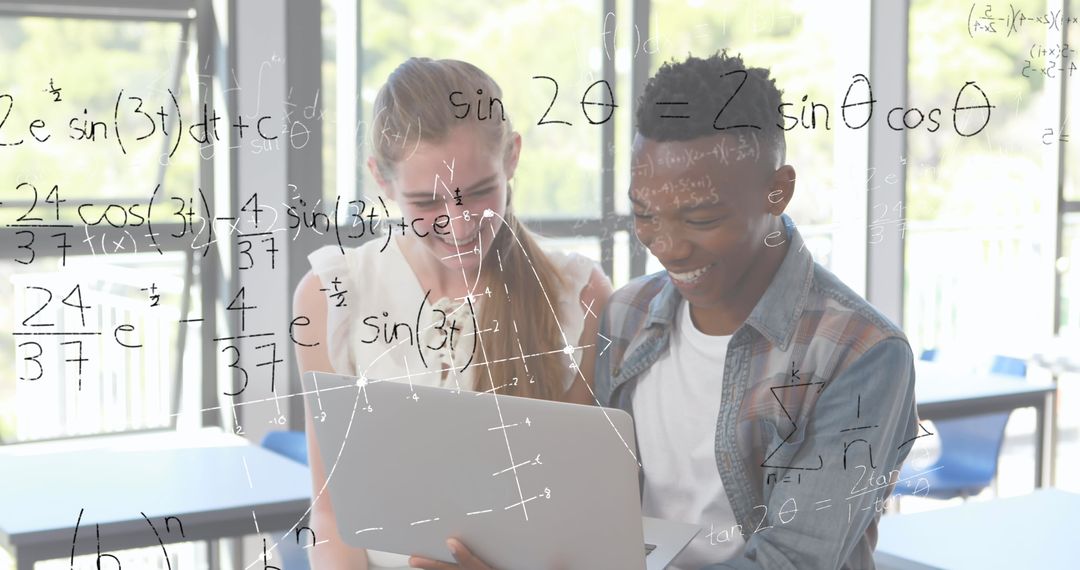 Students Collaborating with Laptop to Solve Math Equations in Classroom