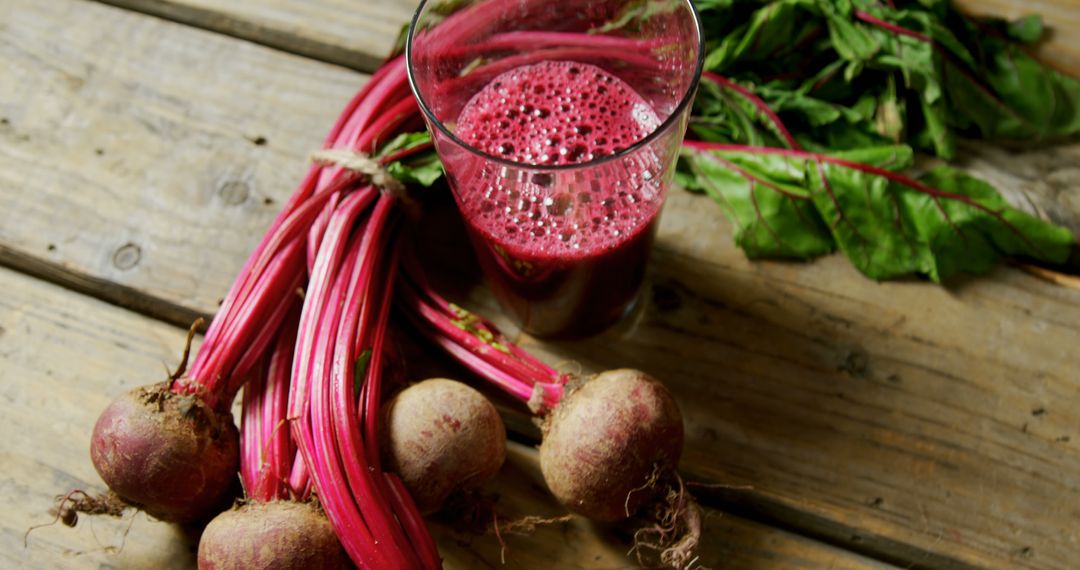 Fresh Beetroot Juice and Beets on Rustic Wooden Table - Free Images, Stock Photos and Pictures on Pikwizard.com