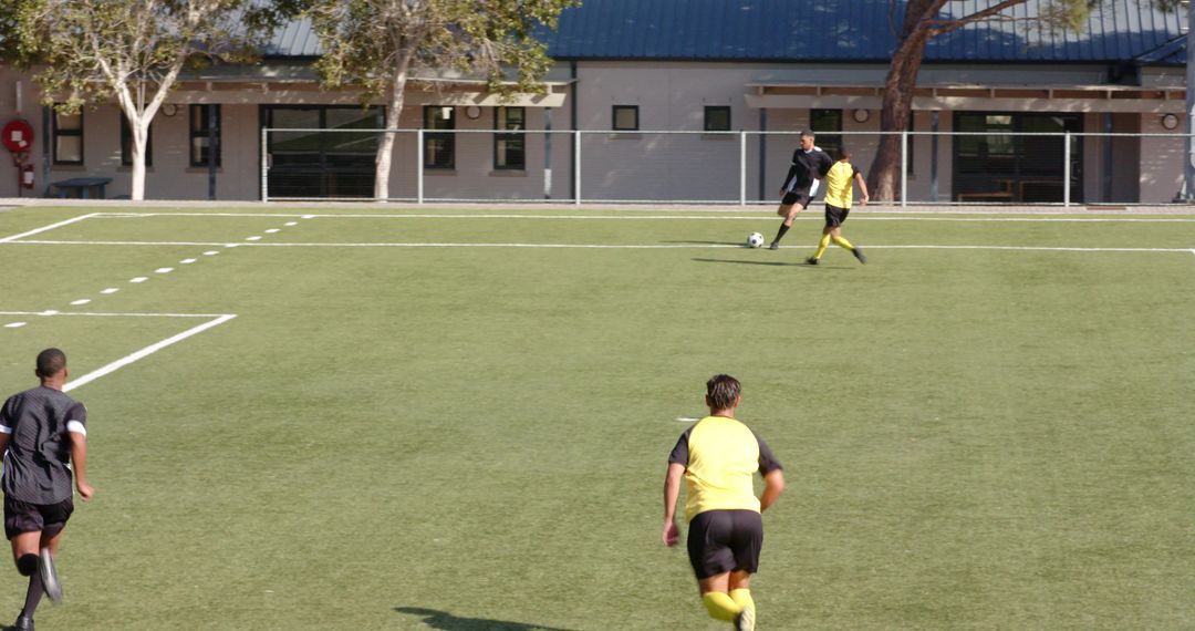 Soccer Players Sprinting and Competing in Intense Match Play