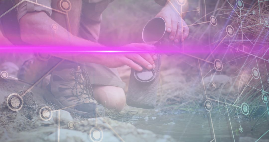 Hiker Filters Stream Water with Technological Overlay