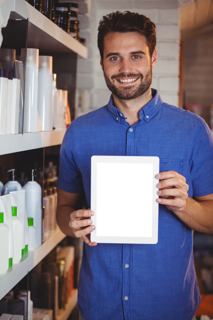 Portrait of Happy Male Stylist Displaying Transparent Screen in Salon - Download Free Stock Images Pikwizard.com